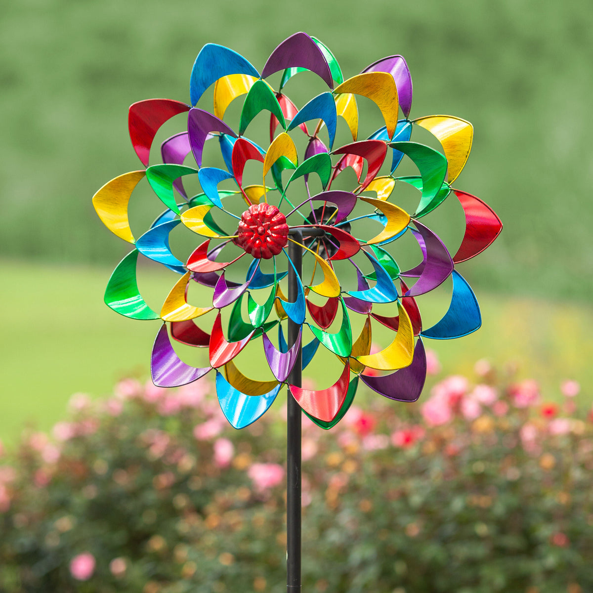 Zinnia wind spinner with multicolor petals on garden stake on Tampa Home & Garden Store