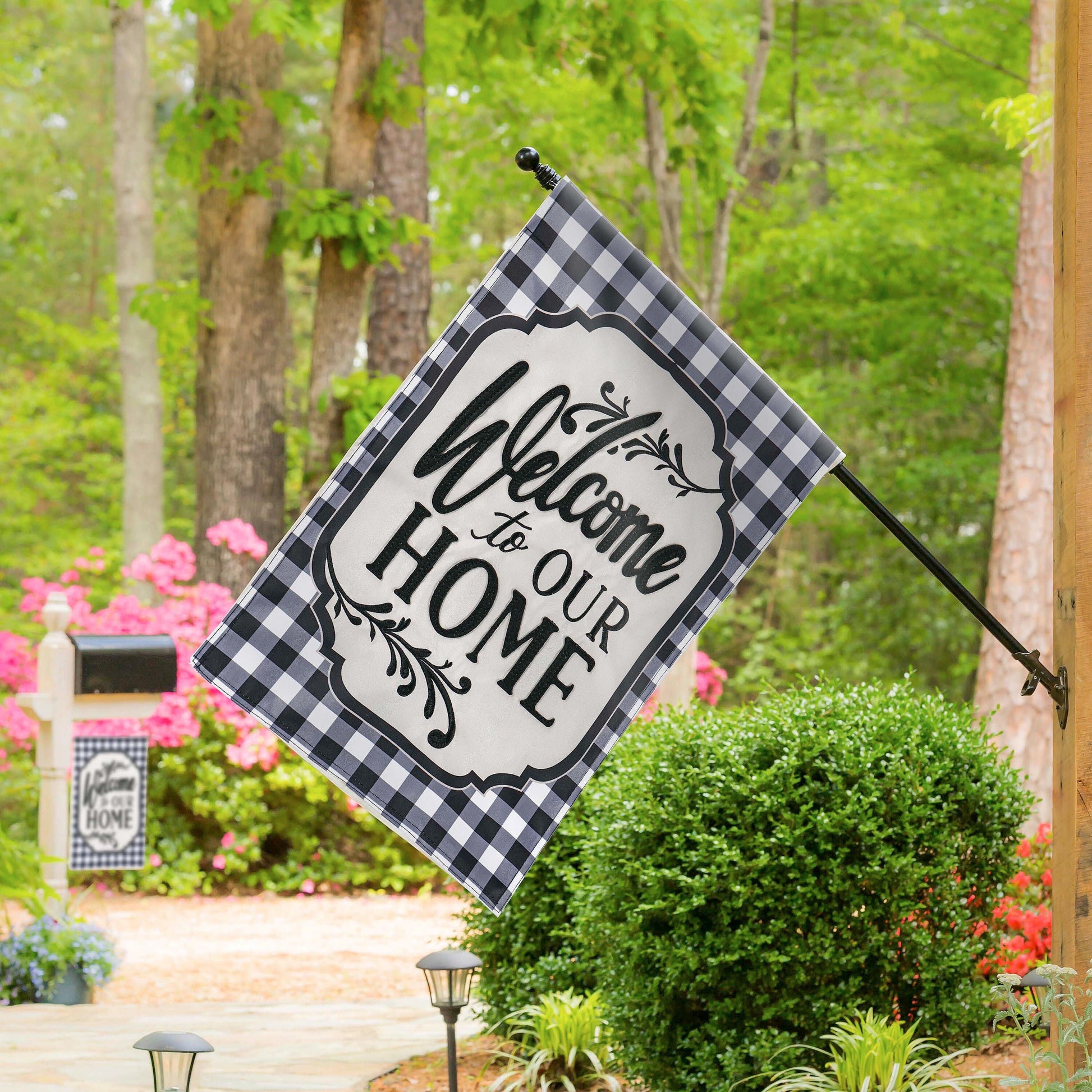 Classic Welcome Home House Applique Flag by Evergreen Enterprises with black-white checker border for outdoor display on Tampa Home & Garden Store