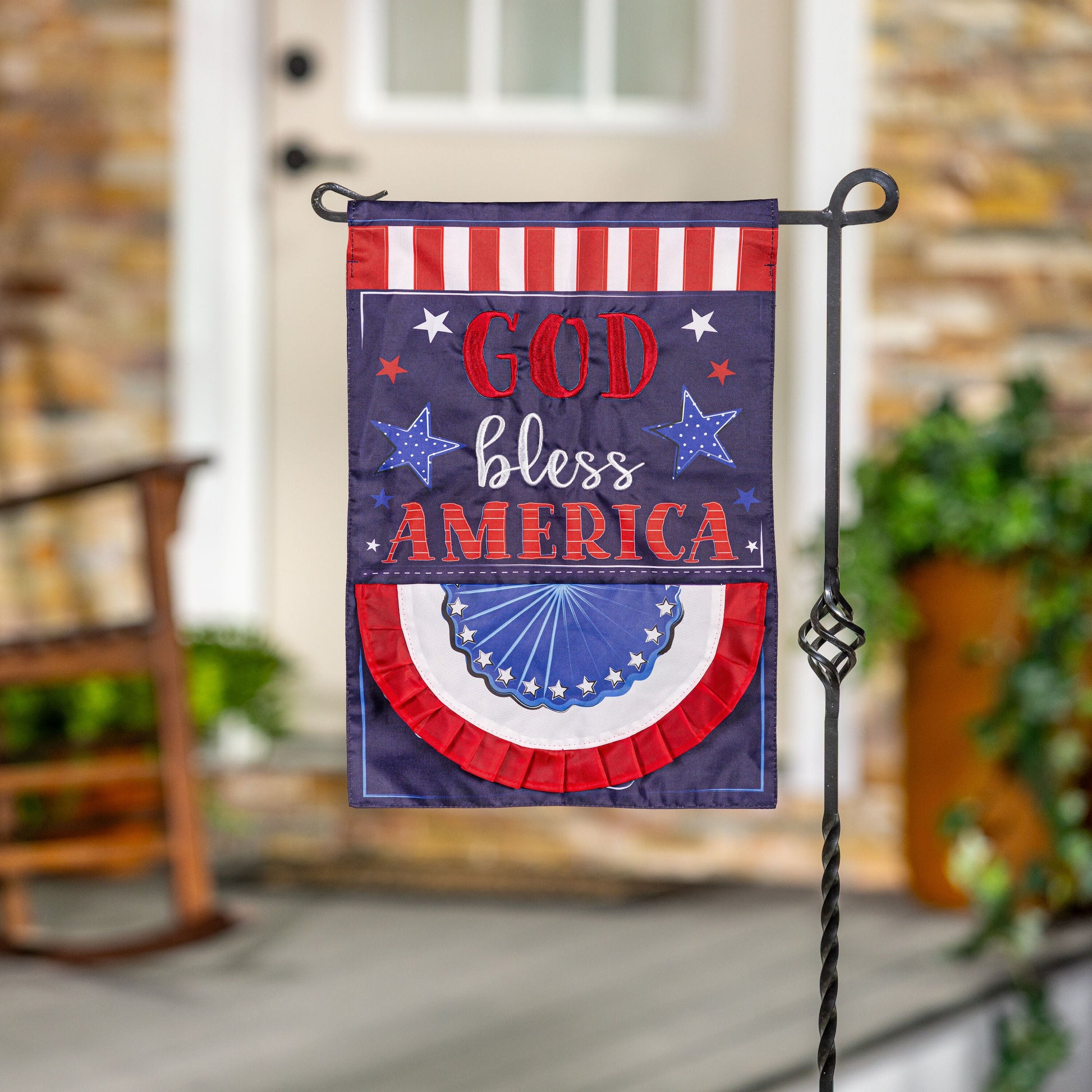 Patriotic God Bless America applique flag with red white stripes blue star field on stand on Tampa Home & Garden Store