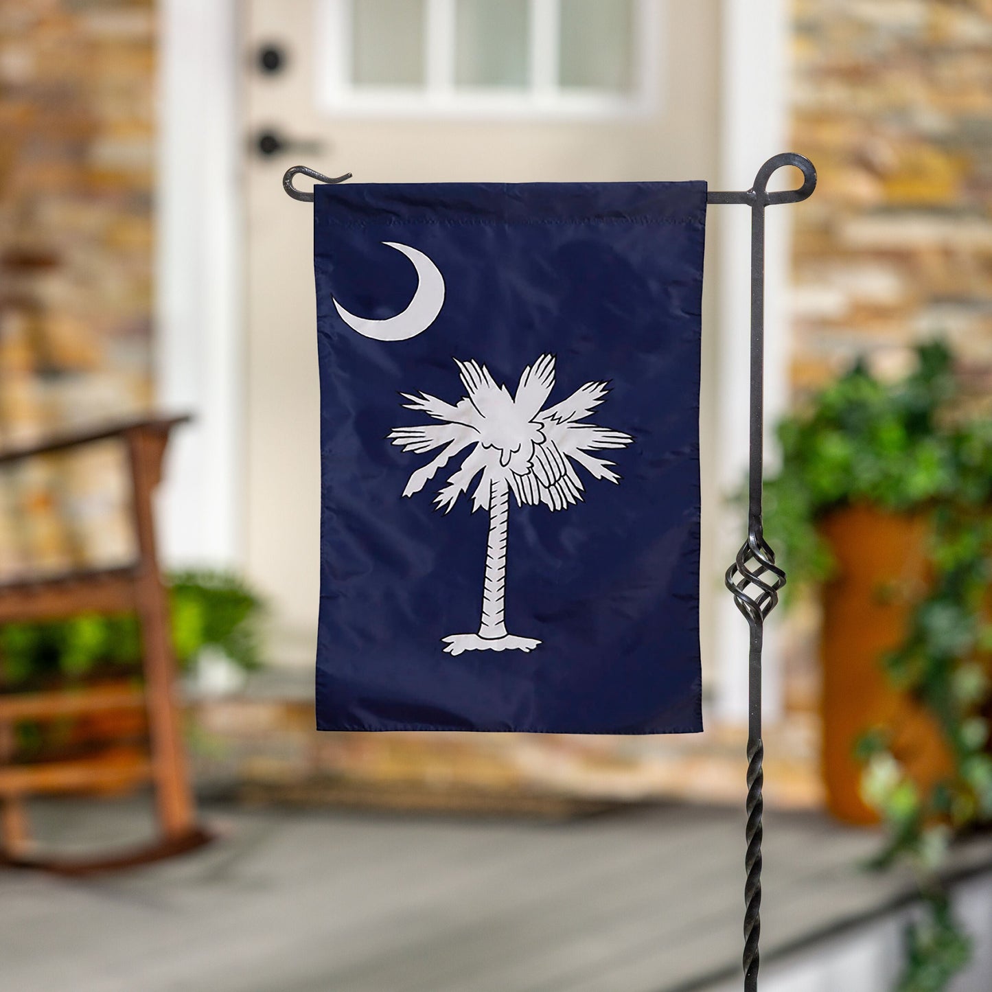 South Carolina Garden Applique Flag navy blue with white palmetto and crescent on flag stand on Tampa Home & Garden Store