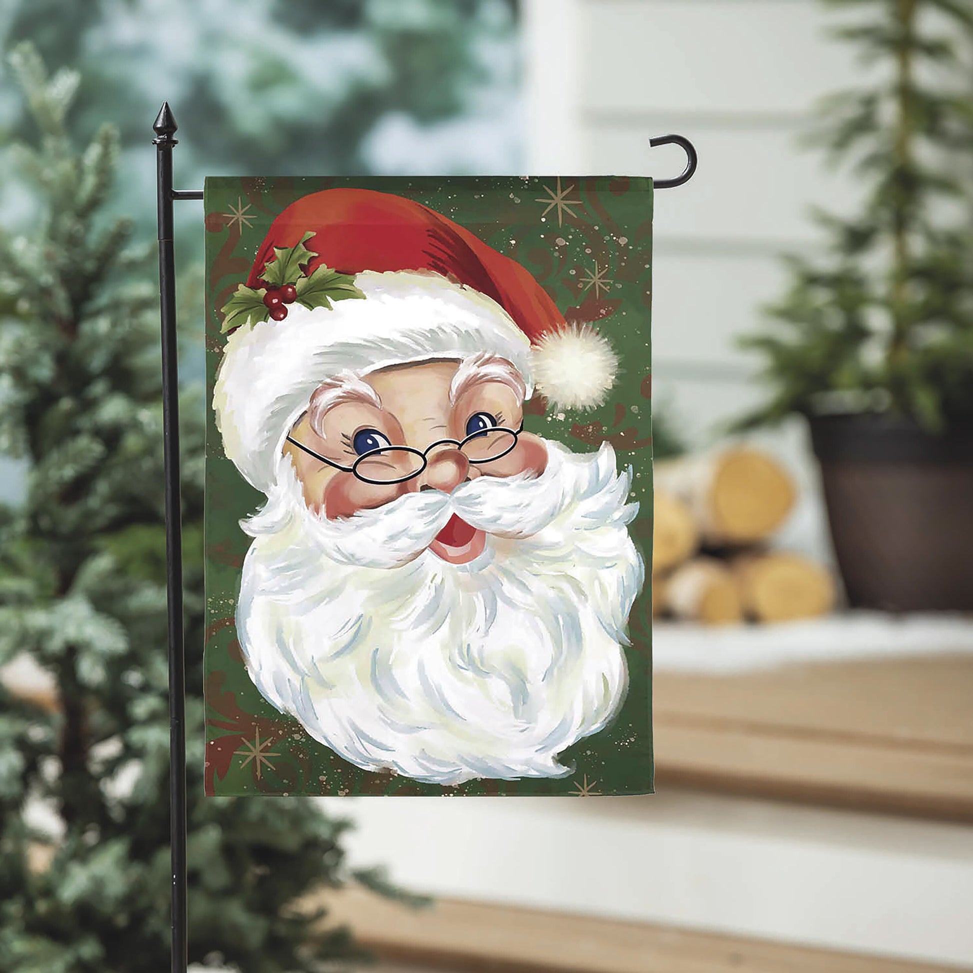 Merry Santa Applique Garden Flag featuring Santa in a red hat on a green festive background on Tampa Home & Garden Store