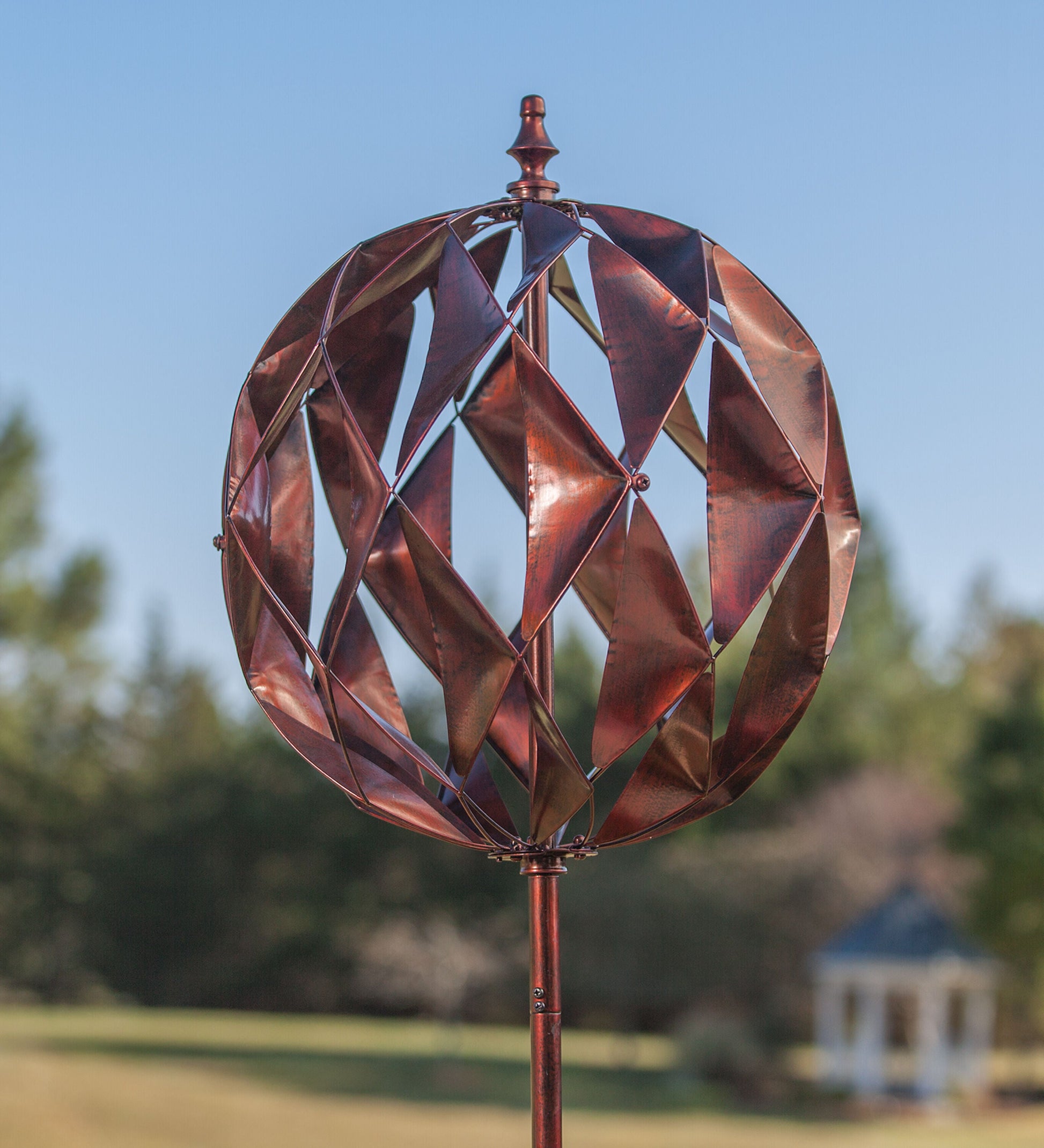 Harlequin Ball Wind Spinner copper-toned metal wind ornament for outdoors on Tampa Home & Garden Store