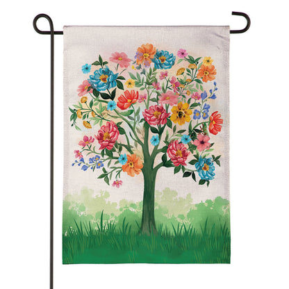 Blooming Tree of Life Burlap Garden Flag on a stand with colorful flowers on Tampa Home & Garden Store
