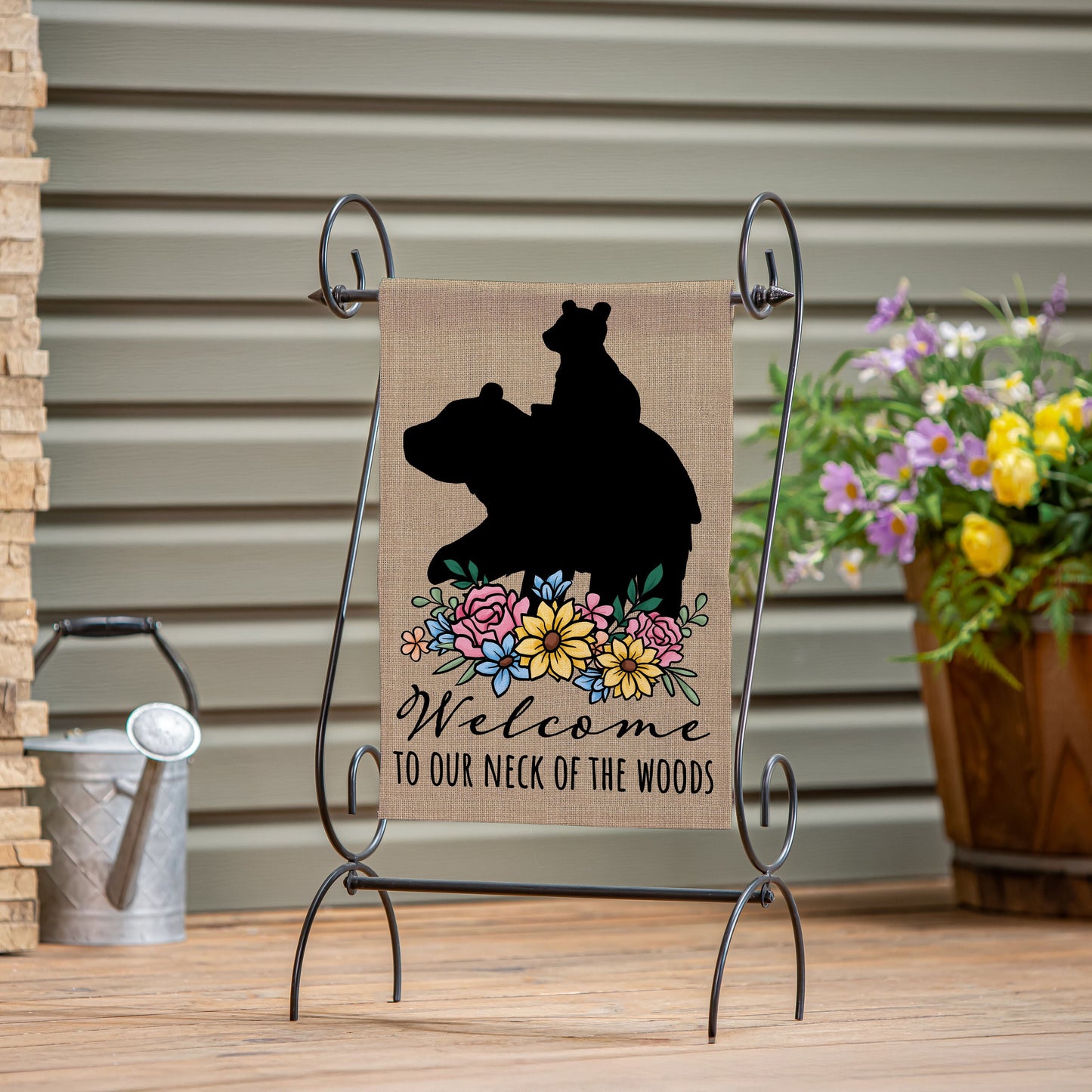 Burlap garden flag Welcome to Our Neck of the Woods with black bear silhouette and floral border on Tampa Home & Garden Store
