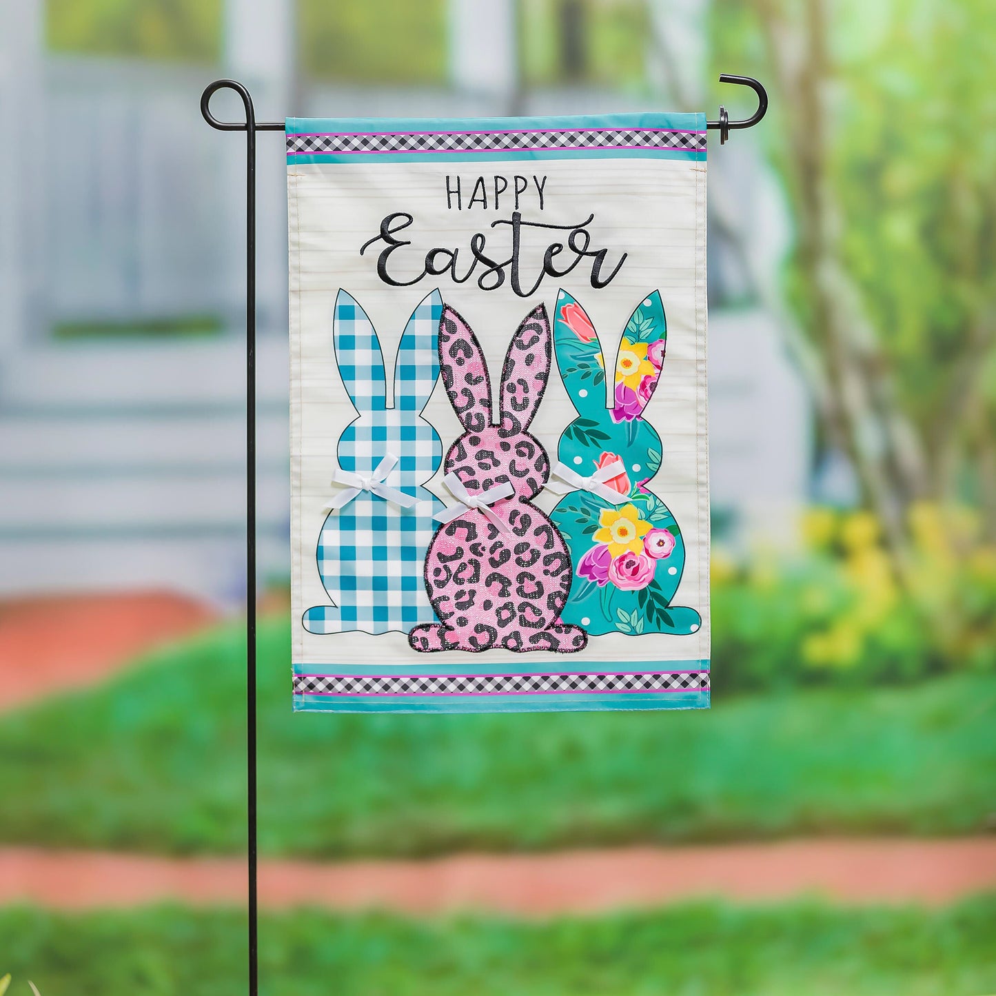 Bright Bunnies Garden Applique Flag with colorful patterned bunny silhouettes and teal border on Tampa Home & Garden Store