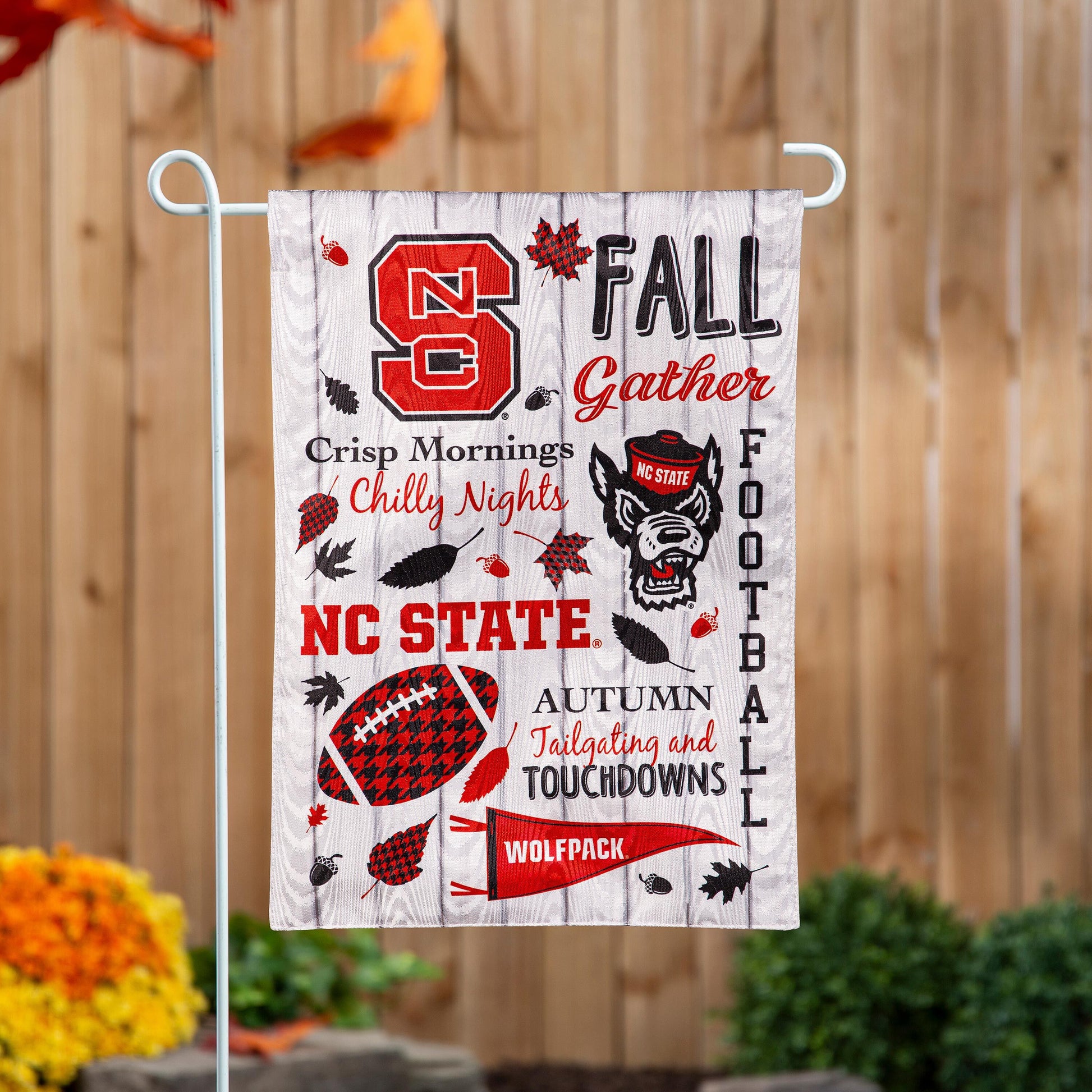 Moire flag featuring NC State Wolfpack fall graphics on a metal garden stand on Tampa Home & Garden Store