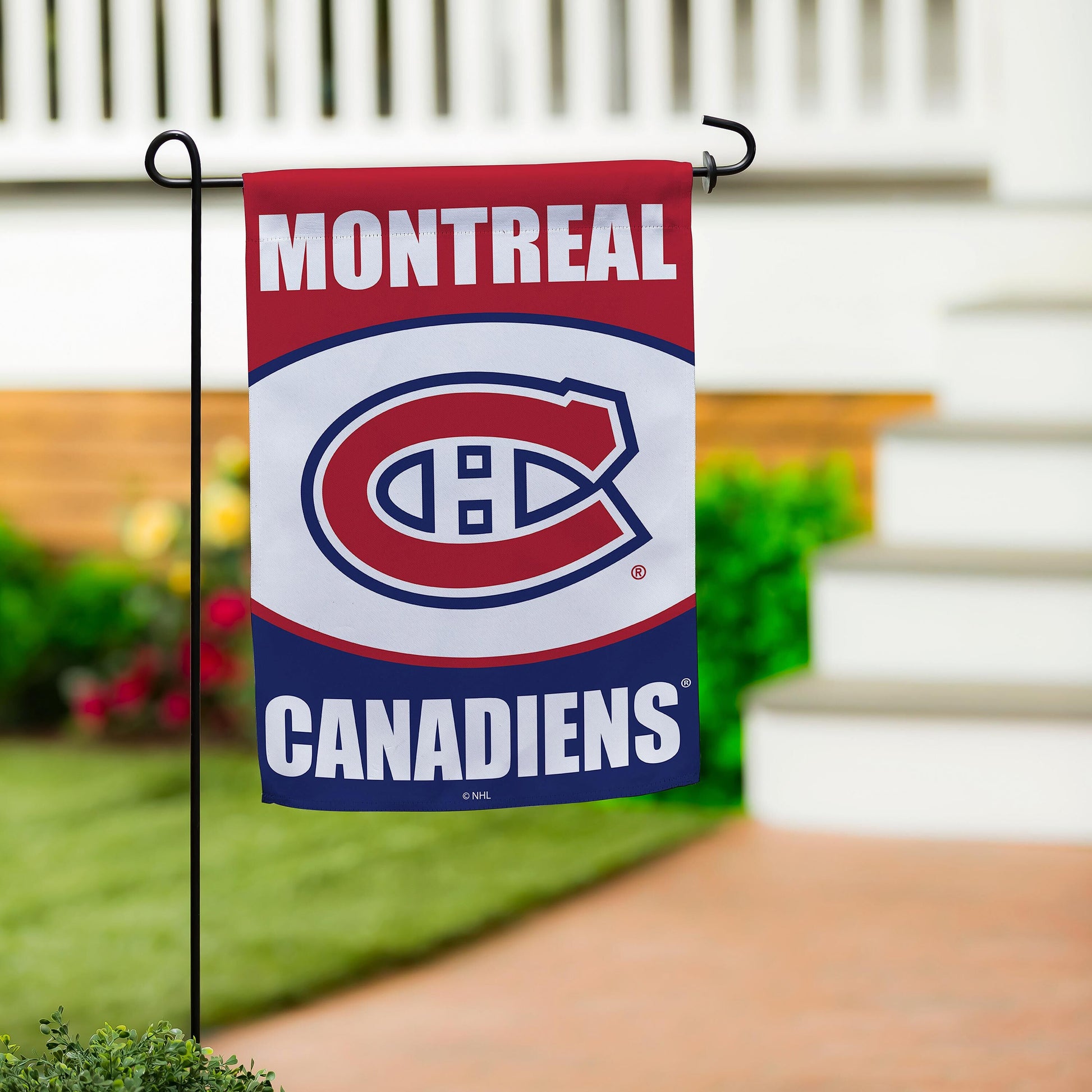 Montreal Canadiens suede garden flag on stake; red header MONTREAL in white and blue emblem on Tampa Home & Garden Store