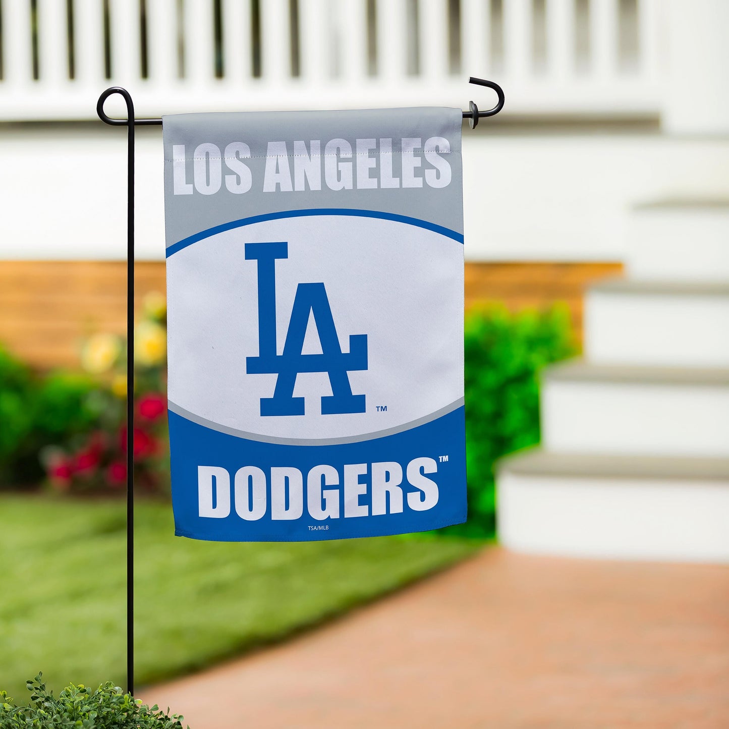 Los Angeles Dodgers suede flag on a black garden stake with bold LA text and blue emblem on Tampa Home & Garden Store