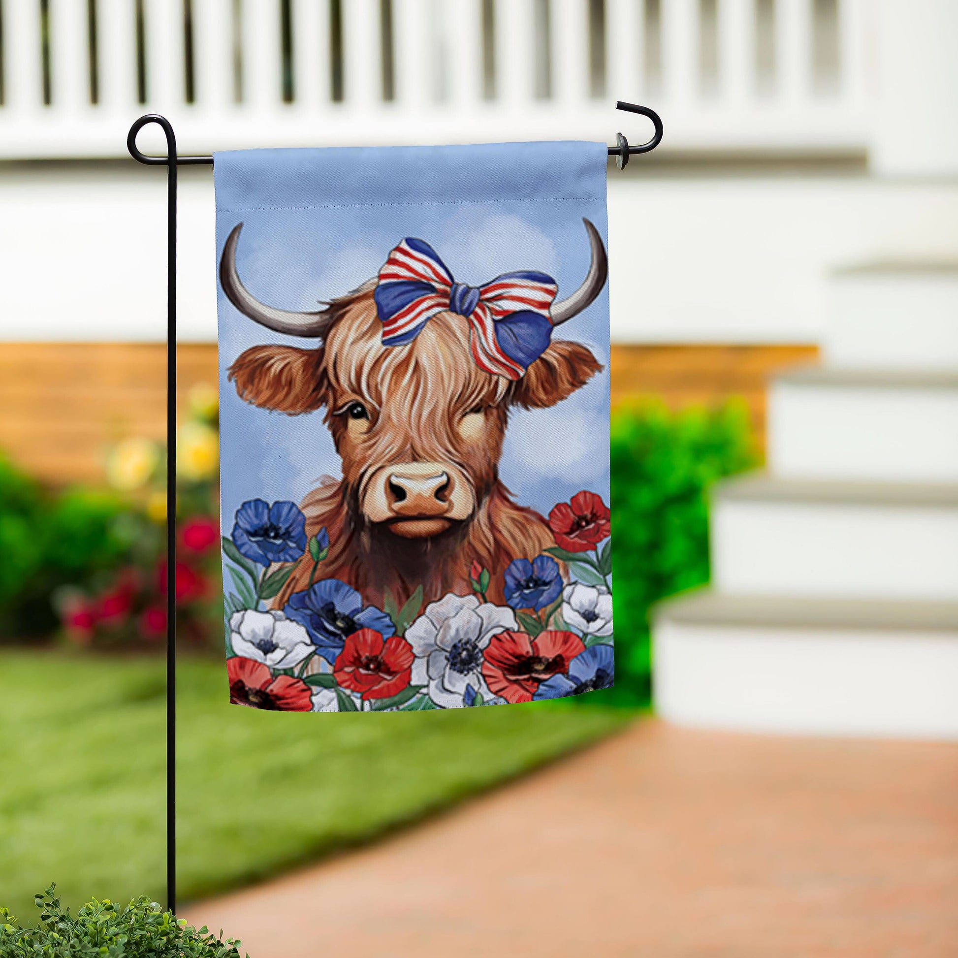 Patriotic Highland Cow applique garden flag on light blue background with bow and flowers on Tampa Home & Garden Store
