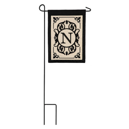 Cambridge Monogram Garden Flag N applique, beige center with black frame, on black metal stand on Tampa Home & Garden Store