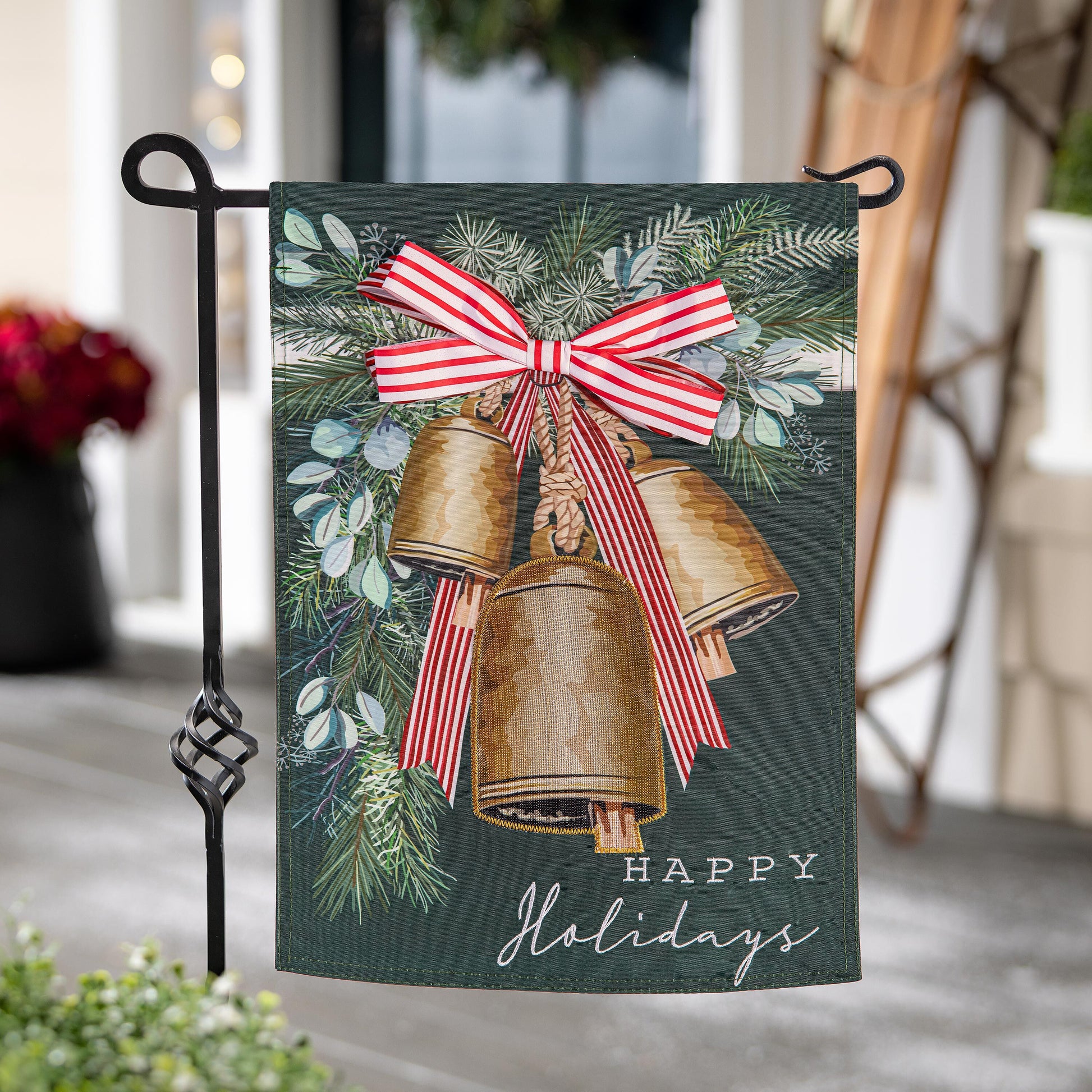 Golden Bells Applique Garden Flag with gold bells and red striped ribbon on green background on Tampa Home & Garden Store