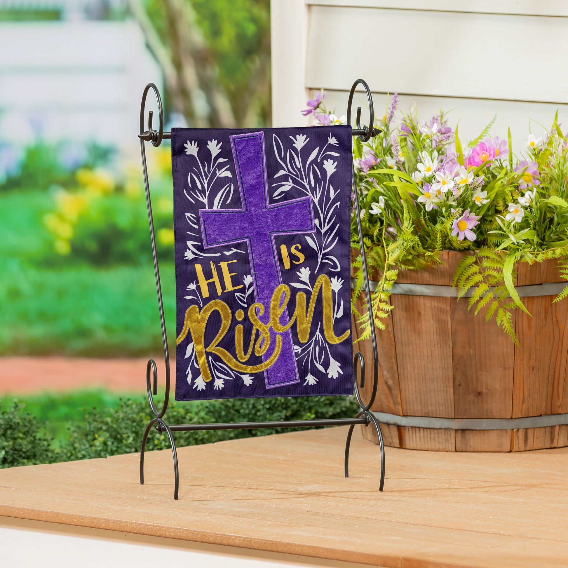 He Is Risen Applique Garden Flag, purple with gold lettering and white floral cross motif on Tampa Home & Garden Store