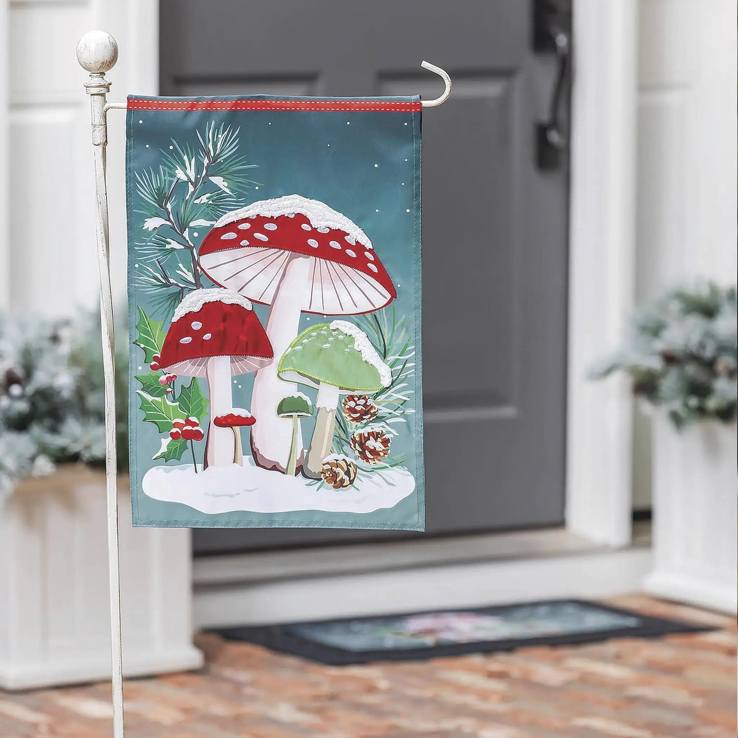 Woodland Winter Mushroom Applique Garden Flag featuring teal background with red mushrooms and pine, Evergreen Enterprises on Tampa Home & Garden Store