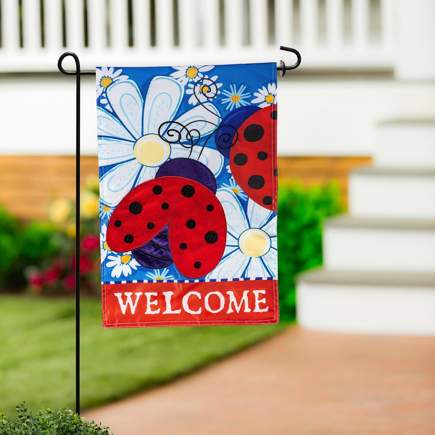 Patriotic Ladybugs Applique Garden Flag on black metal stake with blue background and Welcome on Tampa Home & Garden Store
