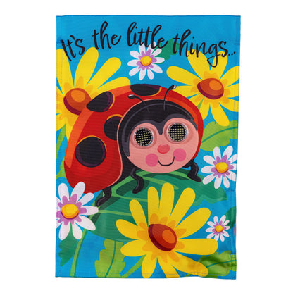 Animated Little Things applique lighted garden flag with a smiling ladybug on a blue sky on Tampa Home & Garden Store