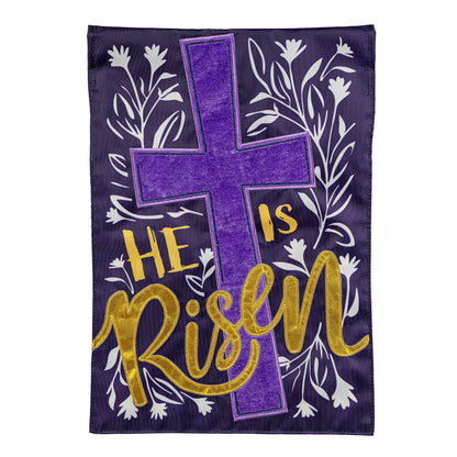 He Is Risen Applique Garden Flag with purple background, gold script and cross accent on Tampa Home & Garden Store