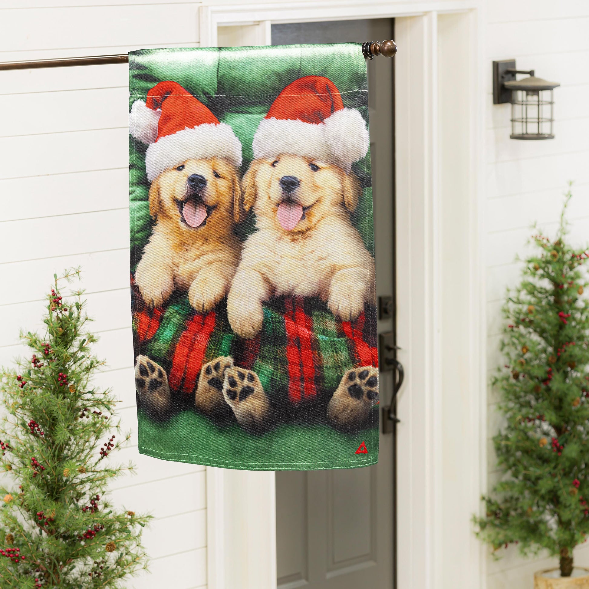 Cozy Goldies Lustre Garden Flag with two Santa-hatted golden retrievers on green background on Tampa Home & Garden Store