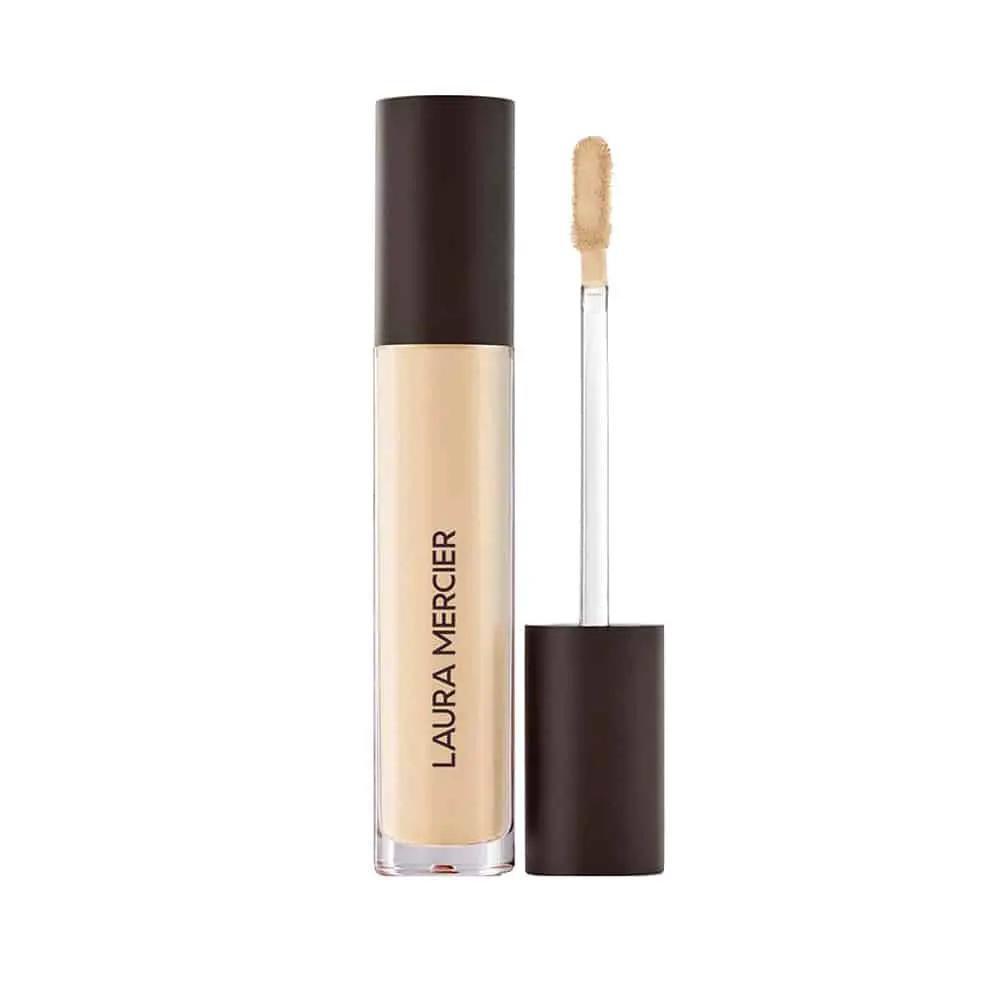 Laura Mercier concealer bottle with applicator wand, beige shade, glass tube, brown cap on Tampa Home & Garden Store