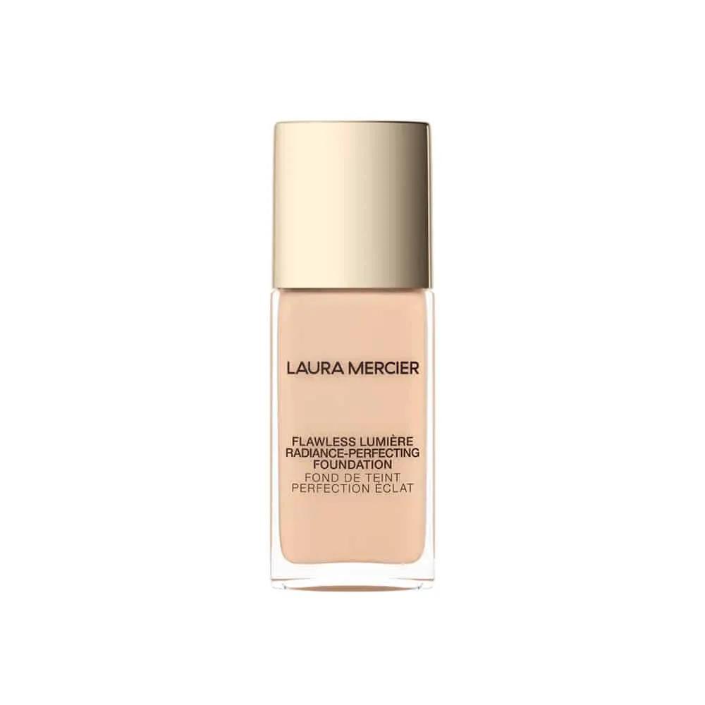 Foundation bottle Laura Mercier Flawless Lumiere foundation in beige with gold cap on Tampa Home & Garden Store