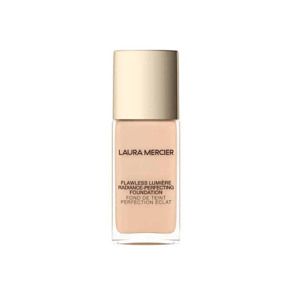 Foundation bottle Laura Mercier Flawless Lumiere foundation in beige with gold cap on Tampa Home & Garden Store