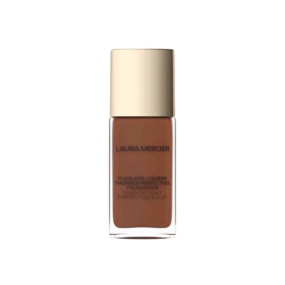 Laura Mercier Flawless Lumière foundation bottle in warm brown glass with gold cap on Tampa Home & Garden Store