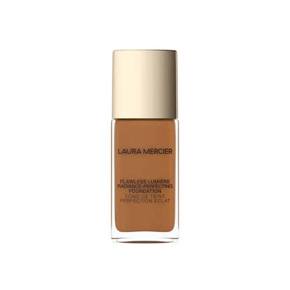 Laura Mercier Flawless Lumière Foundation bottle in warm tan shade with gold cap on Tampa Home & Garden Store