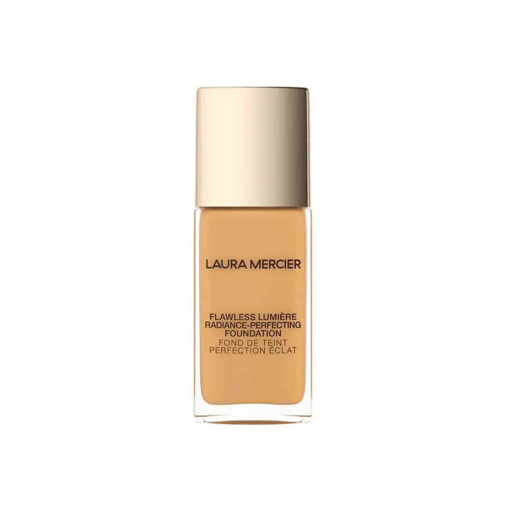 Laura Mercier Flawless Lumiere Foundation bottle in beige with a gold cap, Nava Beauty on Tampa Home & Garden Store