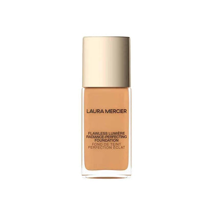 Foundation Laura Mercier Flawless Lumiere in a glass bottle with a gold cap, warm beige shade on Tampa Home & Garden Store