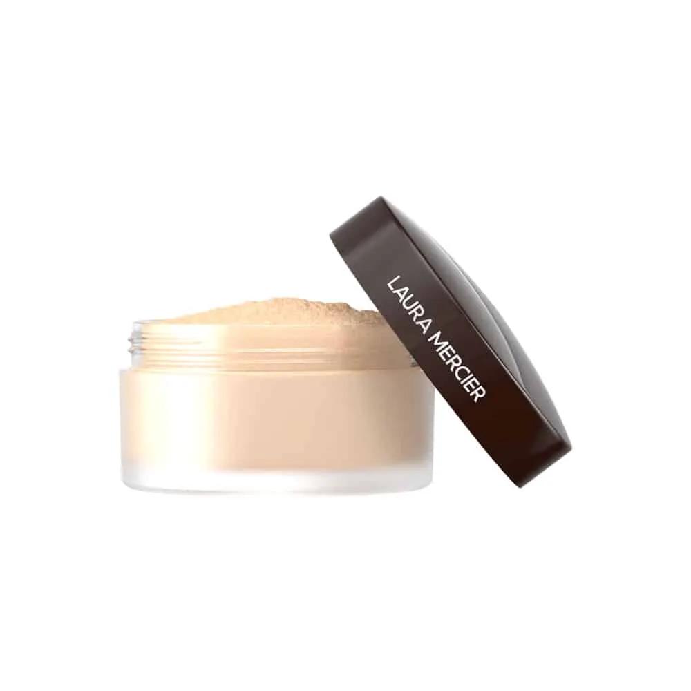  Laura Mercier Translucent Loose Setting Powder in beige, loose powder in clear jar with dark lid on Tampa Home & Garden Store