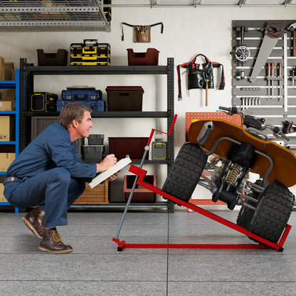DirectDeals riding mower lift jack in red frame elevating a lawn tractor, workshop setting on Tampa Home & Garden Store