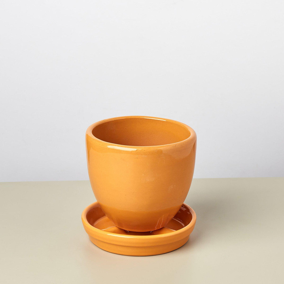 Liberty Bell Planter orange terracotta stack of three pots with saucers on Tampa Home & Garden Store