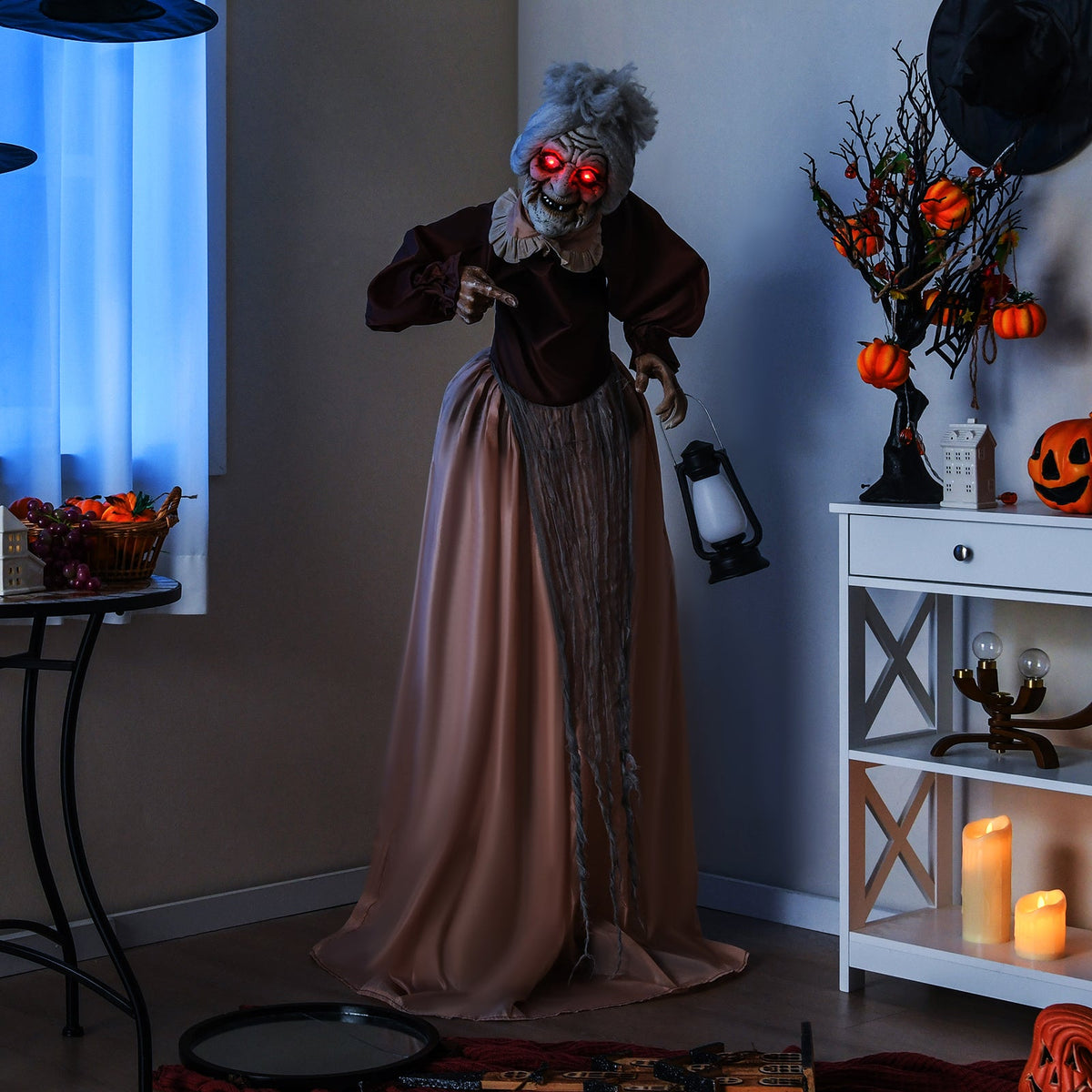 Life-size DirectDeals old lady hag animatronic prop with glowing red eyes in brown gown on Tampa Home & Garden Store