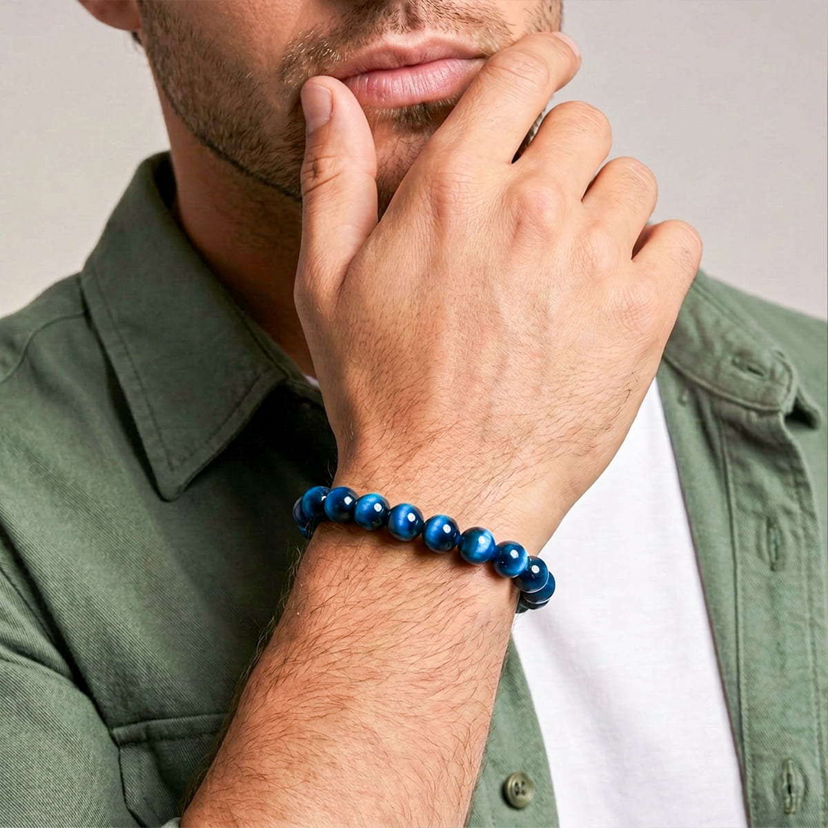 Bracelet Hawk's Focus Royal Blue Tiger Eye Bead Bracelet Conscious Items on a man's wrist on Tampa Home & Garden Store