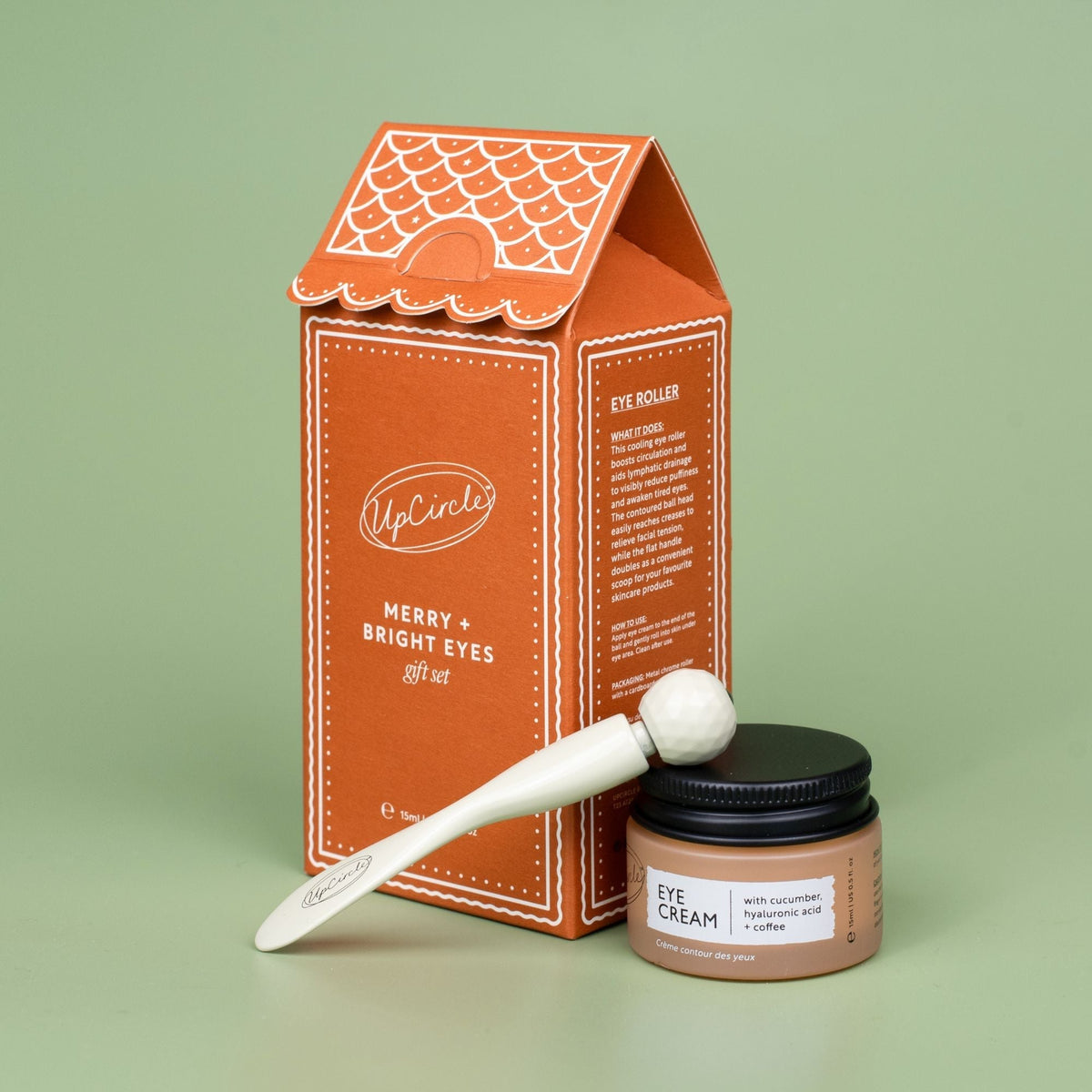 UpCircle Merry + Bright Eyes Gift Set with orange patterned box, eye cream and eye roller on Tampa Home & Garden Store