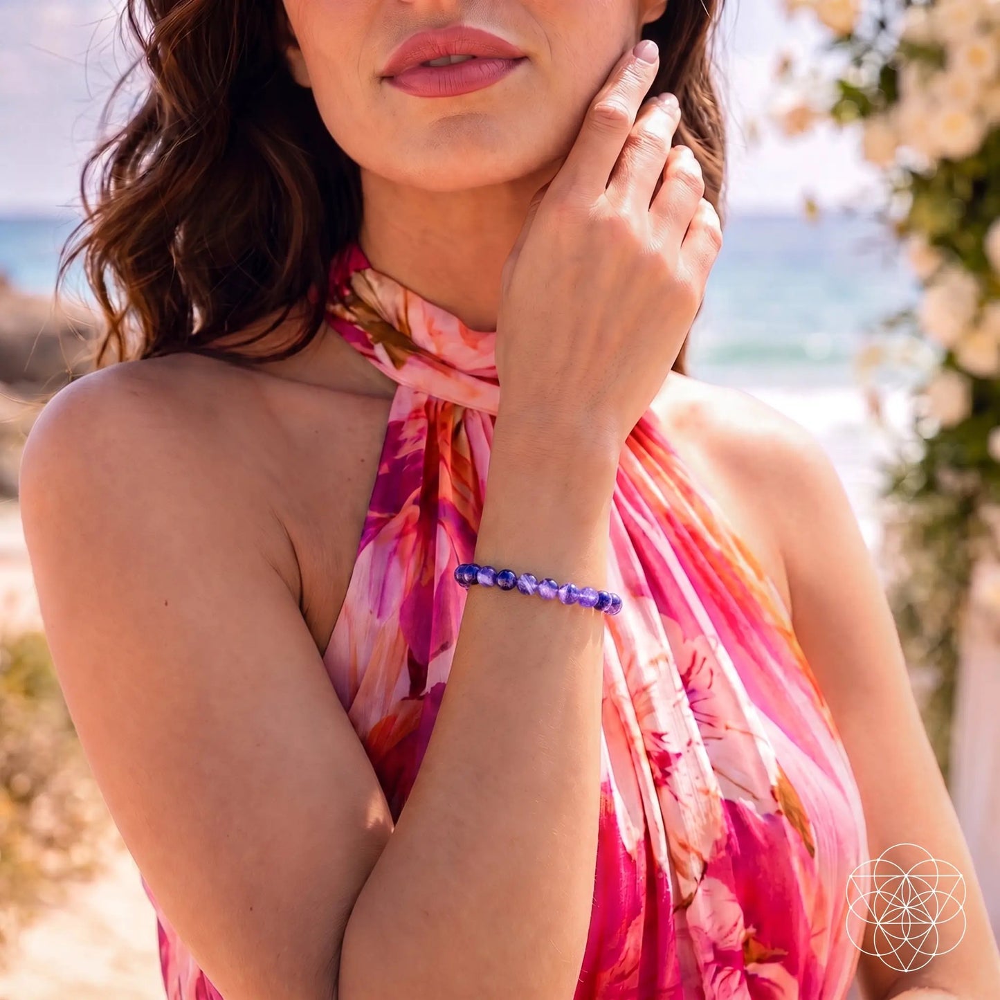 The Purification Bracelet 6mm purple beads on a woman's wrist at the beach Conscious Items on Tampa Home & Garden Store