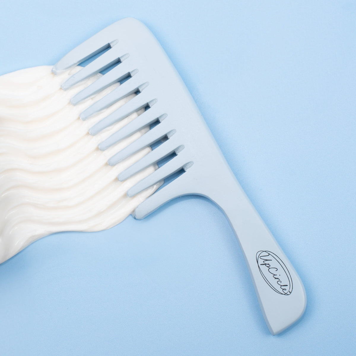 Haircare Duo + Bamboo Wide Tooth Comb by UpCircle, pale blue teeth with cream swirl on backdrop on Tampa Home & Garden Store