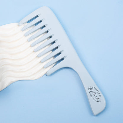 Haircare Duo + Bamboo Wide Tooth Comb by UpCircle, pale blue teeth with cream swirl on backdrop on Tampa Home & Garden Store