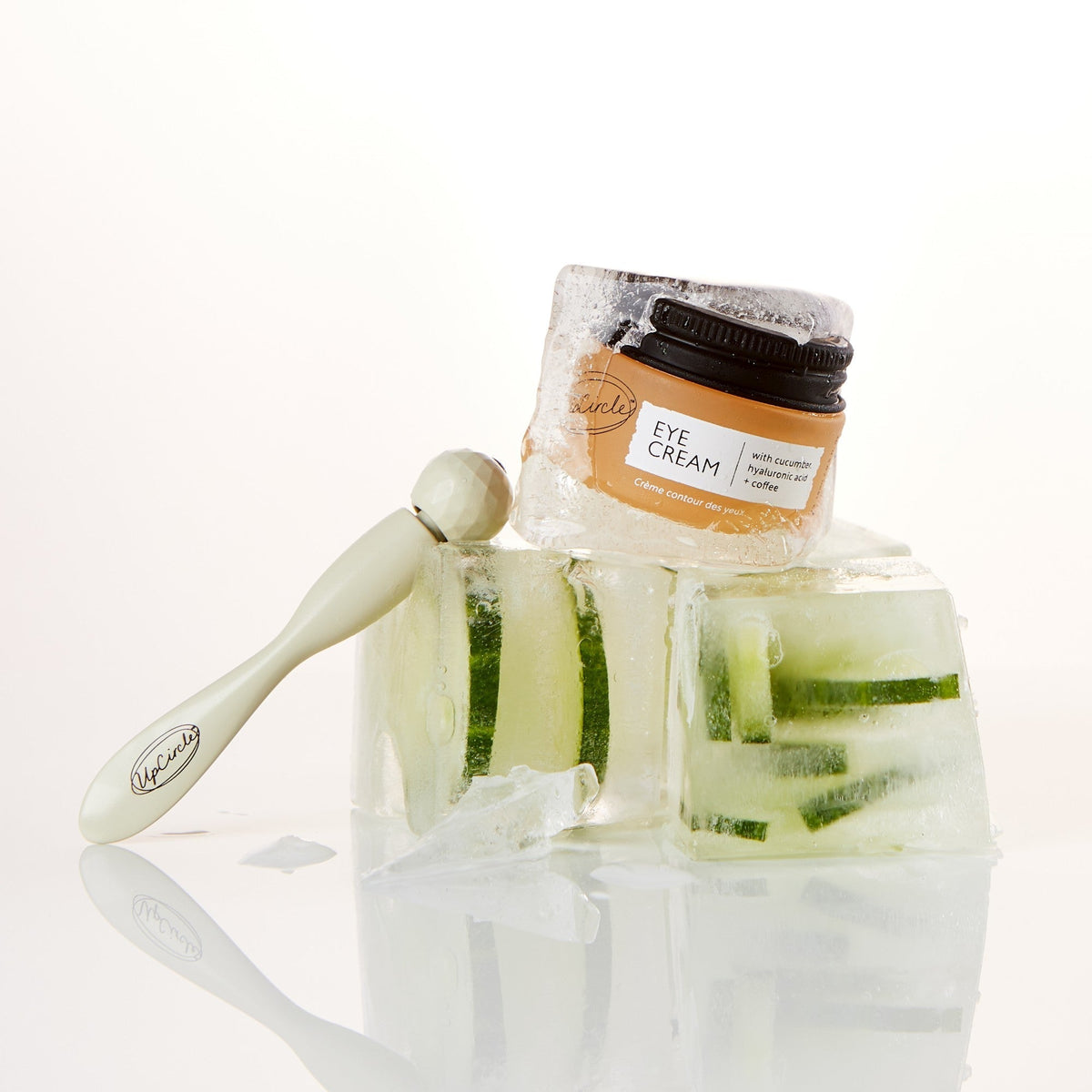 Merry + Bright Eyes Gift Set eye cream by UpCircle in amber jar with black lid on ice on Tampa Home & Garden Store