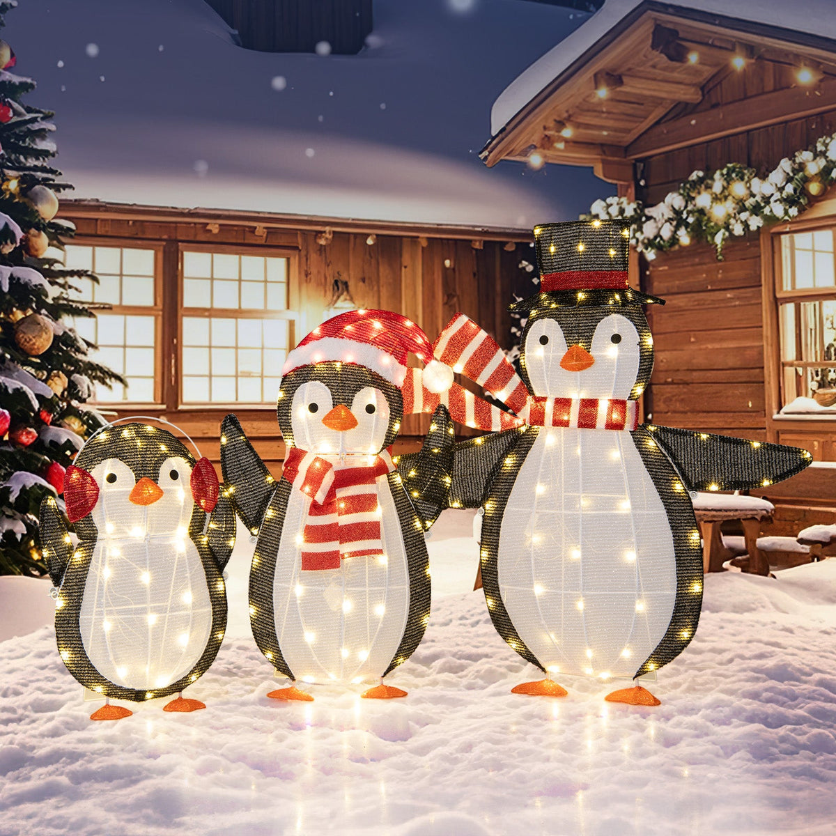 Light up Penguins Christmas Decorations DirectDeals 3 LED penguins with 194 LEDs zip ties in snow on Tampa Home & Garden Store