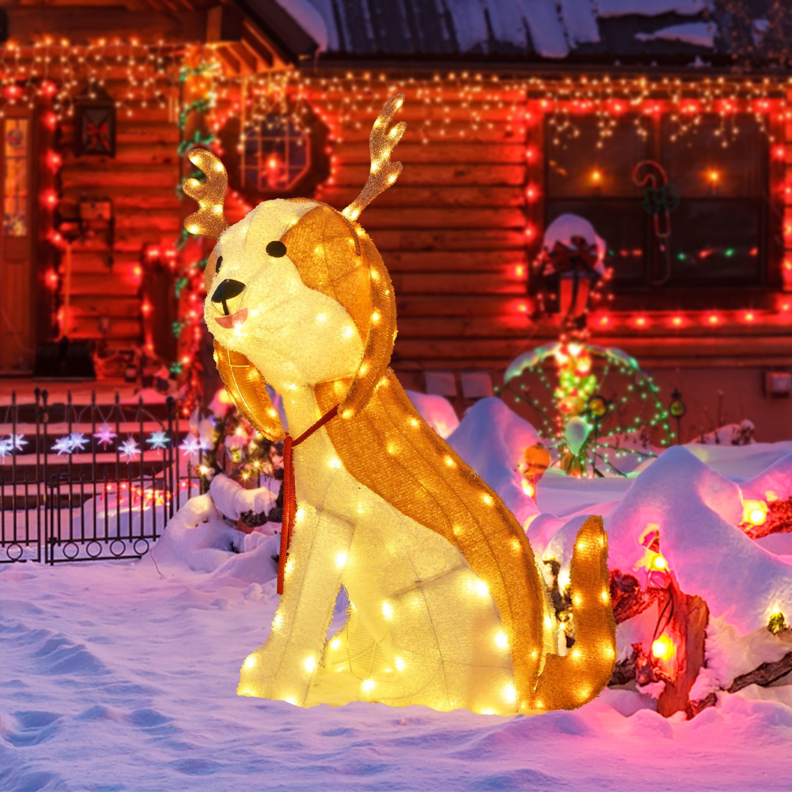 Decorative illuminated reindeer lawn statue with warm white lights in snowy yard on Tampa Home & Garden Store
