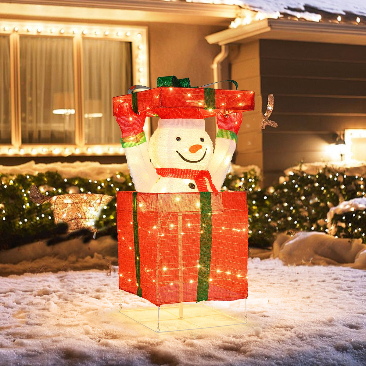 Lighted snowman in gift box decoration with red wrapping and green ribbon DirectDeals on Tampa Home & Garden Store