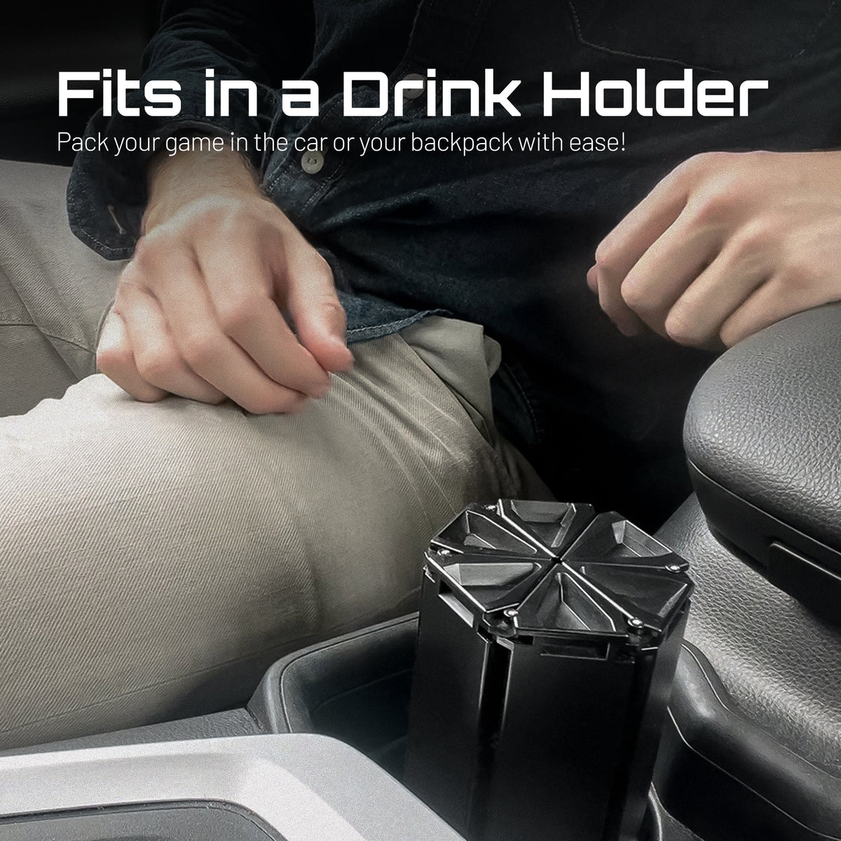 Mini Go board game pieces, black plastic tiles stacked in a car seat, VentureBoard on Tampa Home & Garden Store