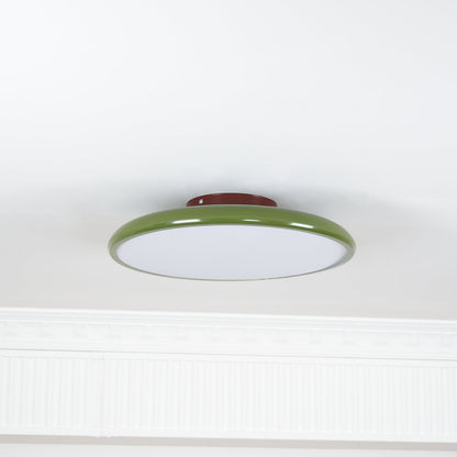Orbitra green round flush-mount LED ceiling light with white diffuser and red mounting base on Tampa Home & Garden Store