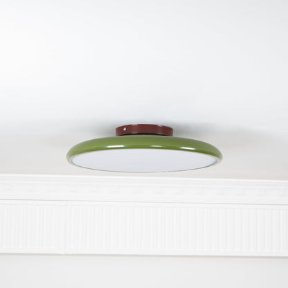 Orbitra flush mount LED ceiling light with green ring and brown base, white diffuser on Tampa Home & Garden Store