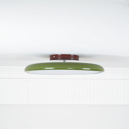 Orbitra flush mount LED ceiling light with swivel arm, green ring and brown canopy on Tampa Home & Garden Store