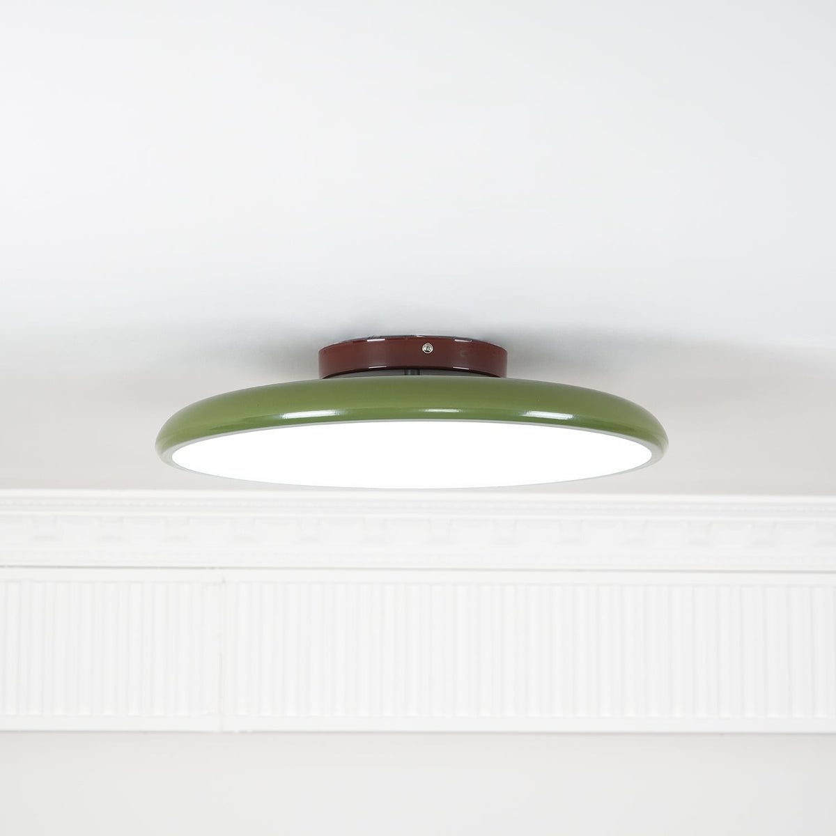Orbitra flush mount LED ceiling light with swivel arm, green ring and brown canopy, dimmable on Tampa Home & Garden Store