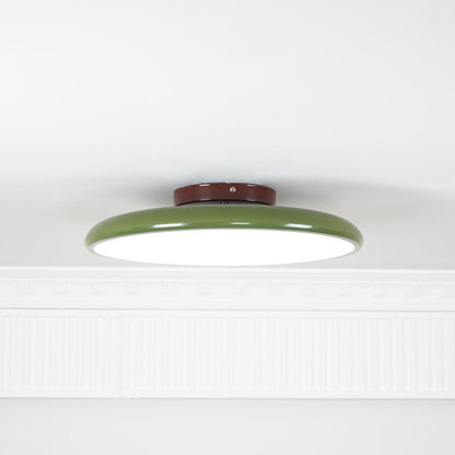 Orbitra flush mount LED ceiling light with swivel arm, green ring and brown canopy, dimmable on Tampa Home & Garden Store