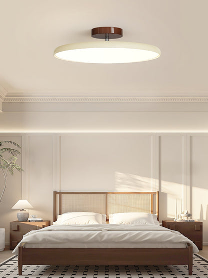 Orbitra flush mount LED ceiling light with swivel arm, beige circular fixture on Tampa Home & Garden Store
