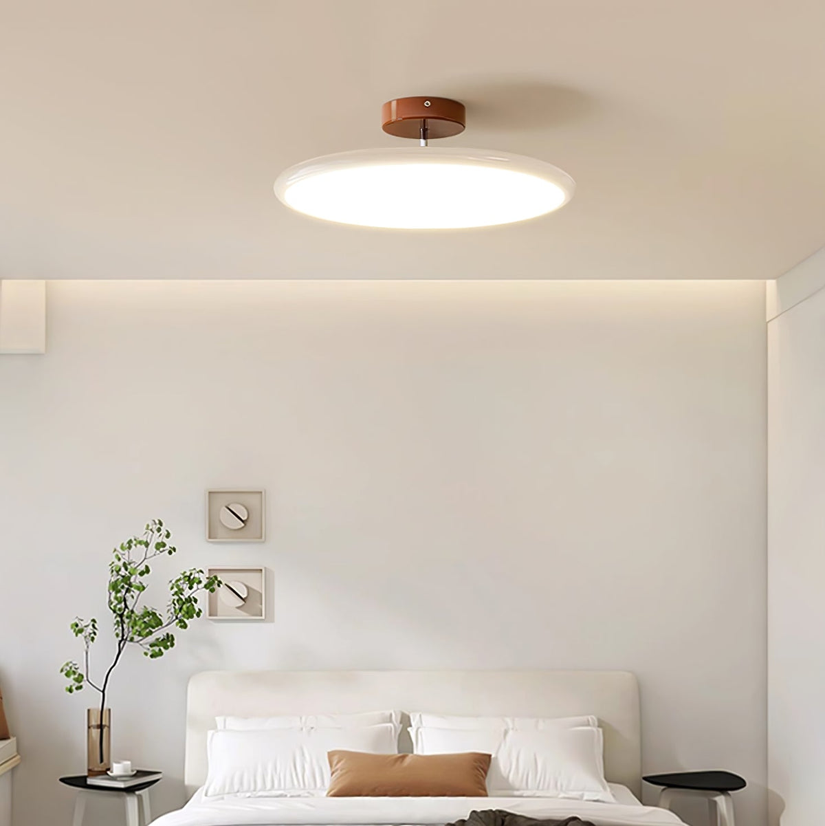 Orbitra flush mount LED ceiling light with round white disk shade and brown canopy on Tampa Home & Garden Store