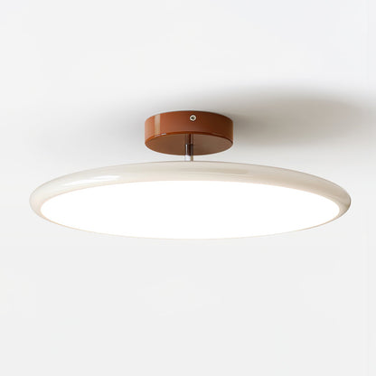 Orbitra flush mount LED ceiling light with swivel arm, beige circular diffuser on Tampa Home & Garden Store